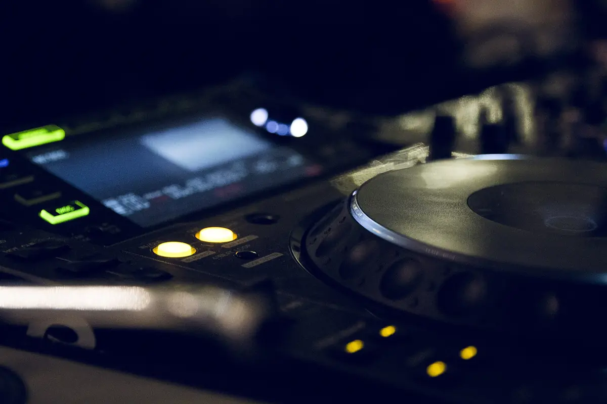 Close-up of a DJ turntable with a record on the platter